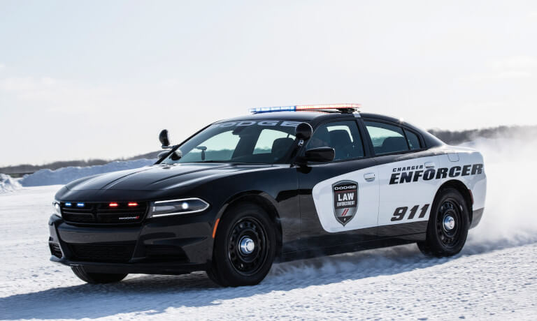 Dodge Charger driving in the snow